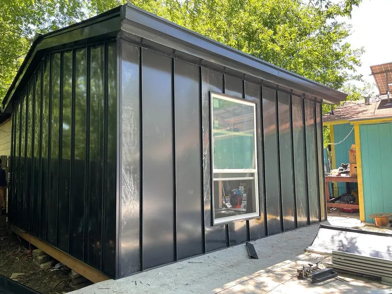 Black standing seam metal wall panels for Roof Inspection in Passaic